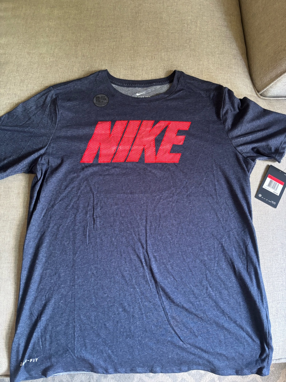 Nike Men’s Dark Blue Short Sleeve Tee with Red Graphic